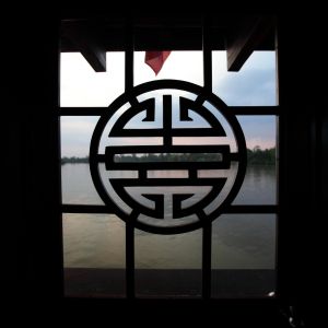 traditional_patterns_on_the_aft_deck_of_a_classic_mekong_bassac_cruise_boat.jpeg